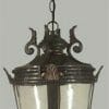 The Albany chain pendant features a vintage design with clear glass panels, a metal frame, decorative scrollwork, and a chain for ceiling mounting.
