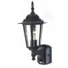 The Tilbury wall light is a black outdoor lantern with clear glass panels, a visible bulb, and a motion sensor at the base, elegantly wall-mounted.