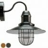 The WL1601- lantern wall light is a wall-mounted industrial outdoor fixture with a wide metal shade and protective cage, shown in a sleek black finish. Two color options are displayed in small circles for added versatility.