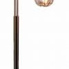 The Lantern floor lamp features a curved neck and caged bulb, casting warm light from its circular base to combine vintage charm with modern style.