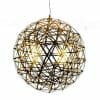 The Moooiraimond pendant light features a spherical shape with an intricate geometric wireframe design and warm glowing internal lights.