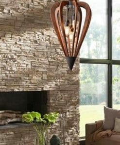Modern living room with a Senorita Series stone fireplace, wooden pendant light, indoor plant, and a large window filling the space with natural light.