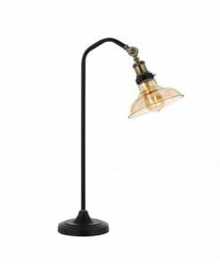 A black metal desk lamp featuring a curved arm and amber glass shade on a round base, inspired by the stylish Hertel floor lamp.
