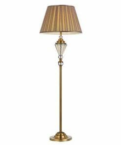 The Oxford floor lamp features a brass finish, round base, vertical pole, glass accent, and a striped fabric lampshade.