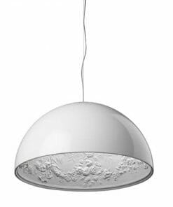 The Space Pendant is a white, dome-shaped light with a smooth exterior and a floral-patterned, textured interior, suspended from a thin cord.