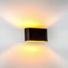The HV8028 Wall light black is a wall-mounted fixture that casts warm yellow light both upward and downward on a white wall.
