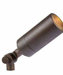 The Laiton Antique Brass outdoor landscape spotlight features an adjustable head and is shown in an angled position.