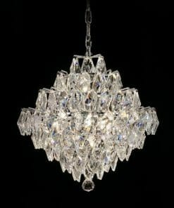 The Asfour crystal 1081 17" 12 light Pendeloque chandelier, with its faceted glass pieces, hangs against a black background and reflects light in multiple directions.
