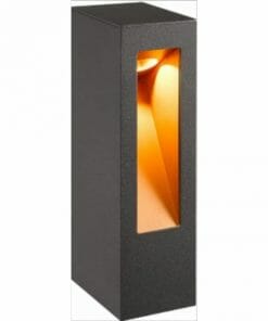 This black rectangular wall sconce, inspired by the Dorset 650 Garden Bollard, features a vertical window displaying a warm yellow interior light.