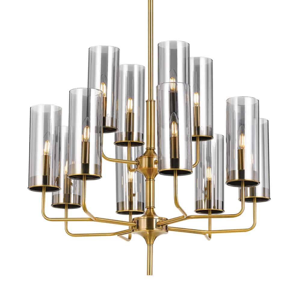 The Decrola 12 light pendant features multiple brass arms with cylindrical clear glass shades and exposed bulbs, making it a striking modern chandelier ideal for contemporary spaces.