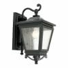 The Nottingham 1 light black exterior wall lantern features clear glass panels and a rectangular backplate, highlighting the visible bulb inside.