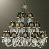 The Luxuria 21 light crystal pendant is a multi-tiered chandelier with black lampshades and sparkling crystal ornaments, elegantly suspended from the ceiling.