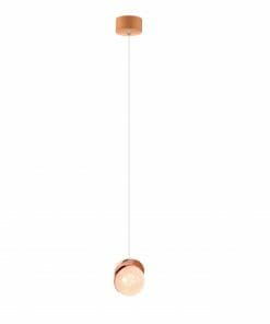 The Saturn 1 pendant showcases a copper finish and a round frosted glass bulb, hanging from the ceiling by a slim white cord for a modern, minimalist appearance.