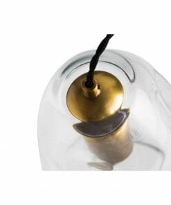 Close-up of the Organic large pendant, showcasing a transparent glass shade, brass fitting, organic design, and black cord.