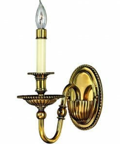 A wall sconce from the Cambridge 3 small range, featuring a candle-style bulb, decorative beading on the base and arm, and an oval backplate.