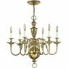 The Cambridge 3 small range chandelier features eight candle-style bulbs in a circular brass frame with ornate curved arms, suspended by a chain—bringing timeless elegance and ideal illumination to smaller spaces.