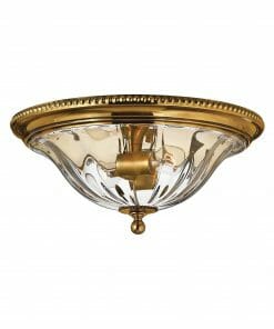 A lighting store offering Cambridge 3 small range gold finish light fixtures with clear glass.