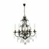 The Louis 15th 24 bronze is a black metal chandelier with six candle-style lights, clear crystal ornaments, elegant 24 bronze accents, and hangs from a chain.