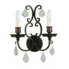 The Louis 15th 2 wall scone bronze features a dark metal finish, faux candle bulbs, and hanging glass crystal ornaments.