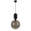 The Kade 1 Smoke is a contemporary pendant light with a round smoke glass globe, central LED filament, and a black cord with matching ceiling mount.
