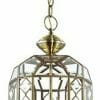 The Errolant 1 brass pendant light features a faceted glass shade, hangs from a chain, and displays three candle-style bulbs inside.