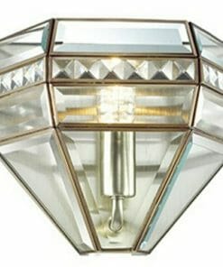 The Eclipse 3 light is a flush-mounted wall fixture featuring a geometric, diamond-shaped glass and metal frame, beautifully illuminated from within.