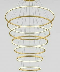 The Tuscan 8 ring Chrome chandelier features eight concentric chrome rings, each decreasing in size from top to bottom and elegantly suspended from the ceiling for a modern look.