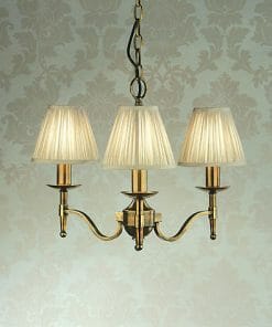 A Standford 3 Antique brass Shimmer shade chandelier available at a lighting store.