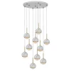 The Onetta 10 cluster black chandelier features nine spherical pendant lights hanging at different lengths from a round mount, with white and gold-accented globes for a modern, chic touch.