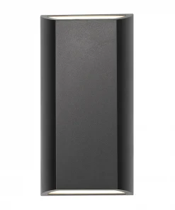 The Bloc LED Up-Down Wall Light is rectangular, finished in matte black, and provides light openings at both the top and bottom.