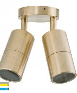 The Tivah double spot Range ceiling spotlight features a brass finish and two adjustable cylindrical shades, displayed against a white background. Color temperature options appear in the bottom left corner.