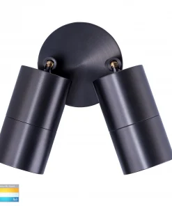 The Tivah double spot Range is a black, twin-cylinder wall light on a circular base, available with color temperature options of 3000K, 4000K, and 5500K.