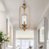 Modern gold pendant light in bright room