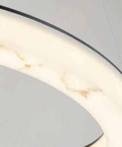 Close-up of curved light fixture with warm tones