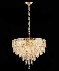Elegant gold crystal chandelier with glowing lights