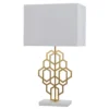 Gold geometric pattern table lamp with white shade