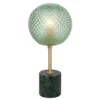 Green textured glass sphere lamp on marble base