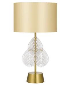 Gold base table lamp with white leaf pattern shade