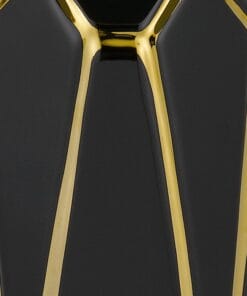 Close-up of black and gold geometric design object